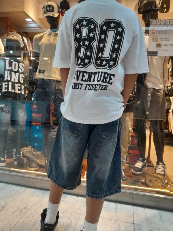 Remera algodón doble estampa overzise niño